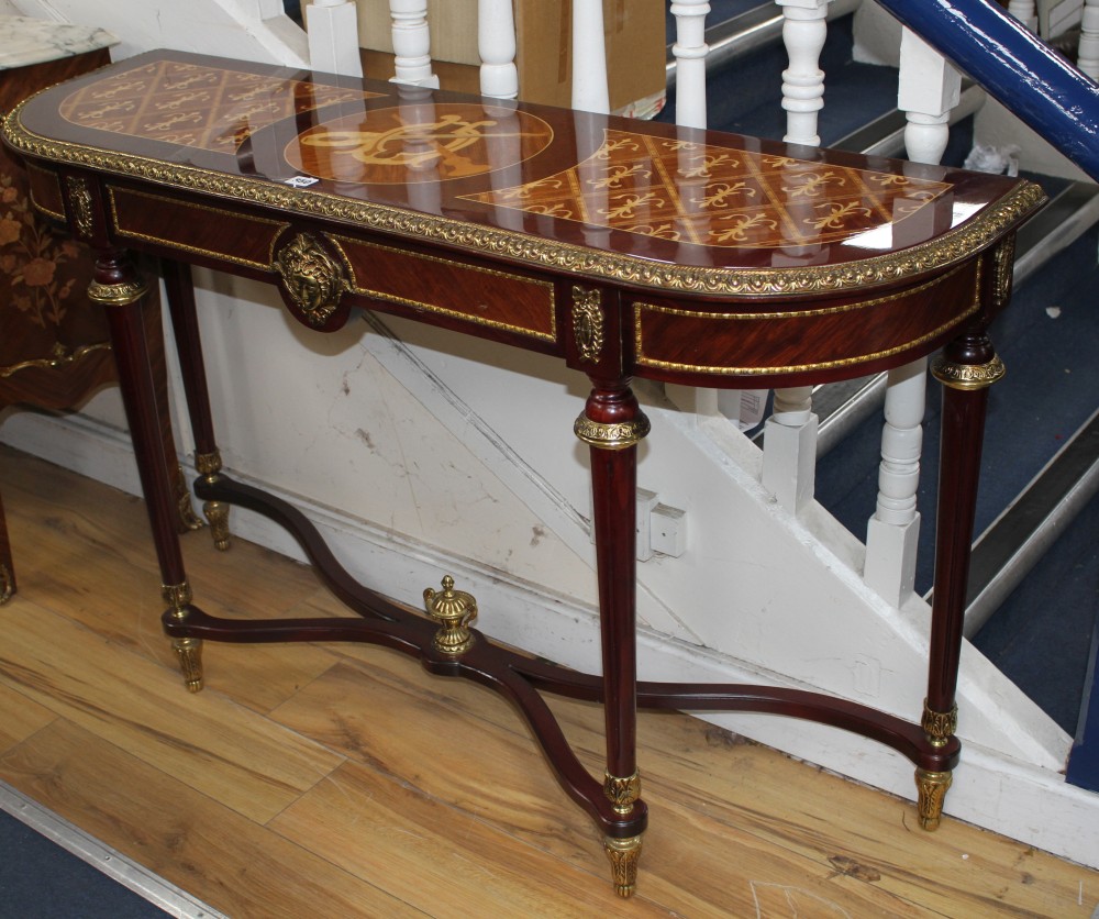 A pair of Meuble Francais marquetry inlaid console tables, W.130cm D.39cm H.80cm